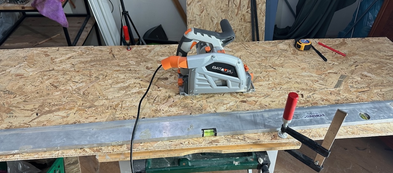 My weapon of choice was this cheap dive saw that I already had. A table saw would have probably made this a lot easier. But with a lot of measuring and clamping this was achievable.