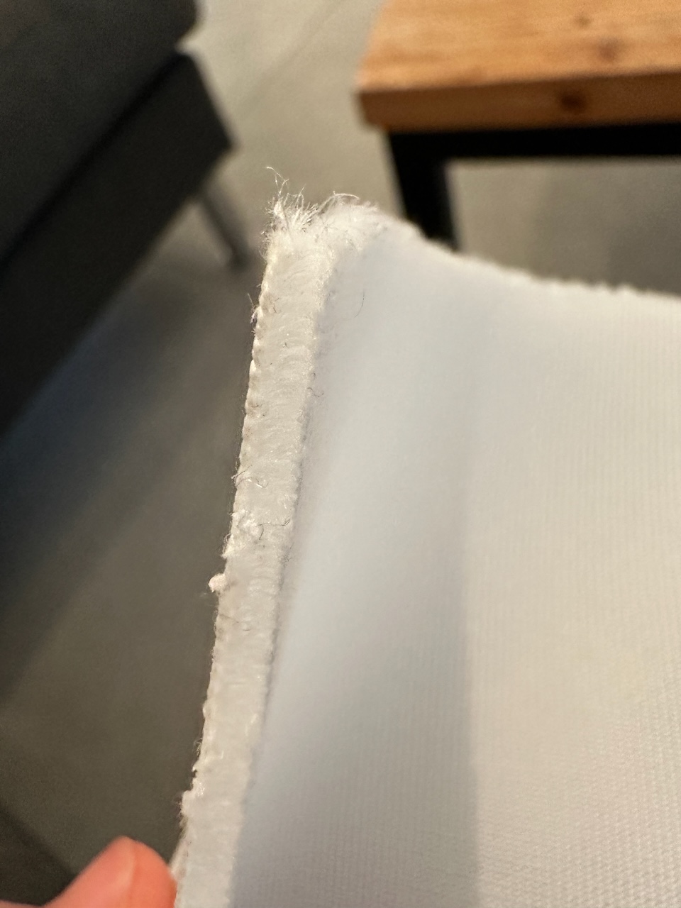 The sample took a few days to arrive from Lithuania, but it confirmed the quality. The 3 layers are clearly visible. Essentially a foam layer sandwiched by two net layers. Overall the fabric also seemed very sturdy and yet a bit elastic. I was convinced.